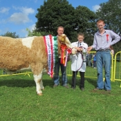 Cappamore 2011 Champion Senior Heifer & Champion Simmental with John & Ronan Touhy and Seanie McGarry, Judge.