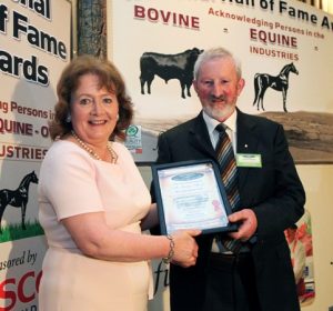 Seamus Aherne receiving the 2016 Simmental Hall of Fame Award from Mairead Lavery, IFJ
